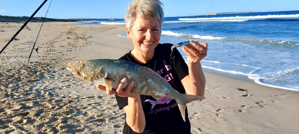 photo of fishing sister with a salmon
